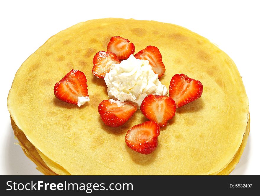 Pancakes filled with whipped cream cheese and strawberry. Pancakes filled with whipped cream cheese and strawberry