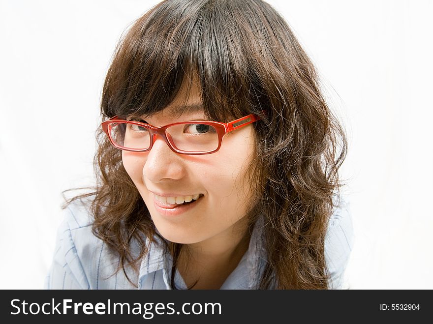 A very cute girl wearing red frame glass and light blue shirt