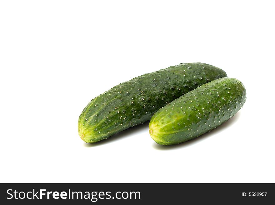 Cucumbers on the white background. Cucumbers on the white background