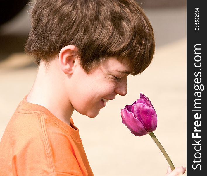 Little Boy With A Flower