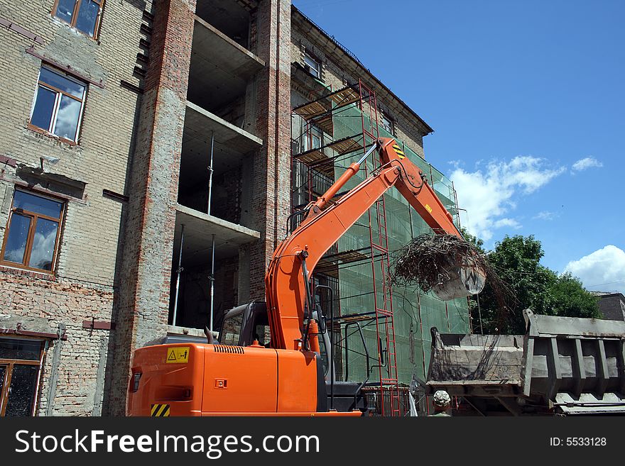 Excavator on a building place. Excavator on a building place