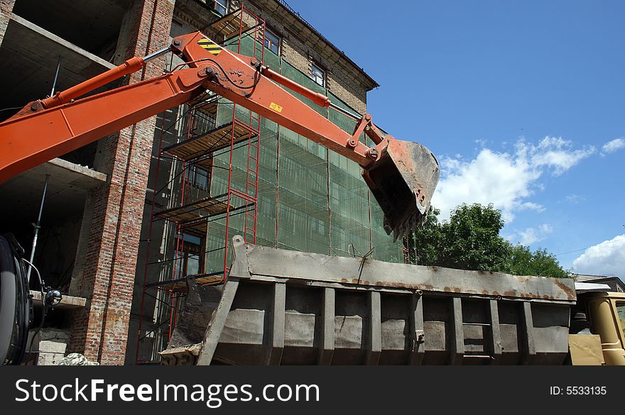 Excavator on a building place. Excavator on a building place