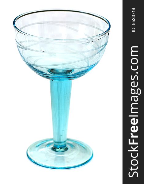 Empty blue cocktail glass isolated on white