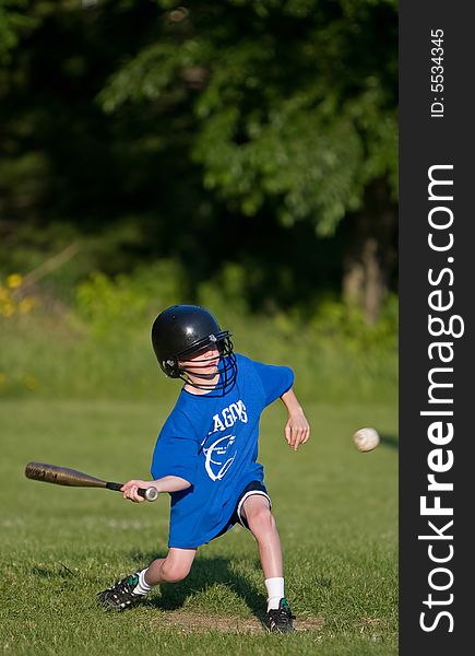 Young boy playing little league. Young boy playing little league