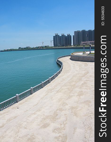 Coast with White railing and sand. Coast with White railing and sand