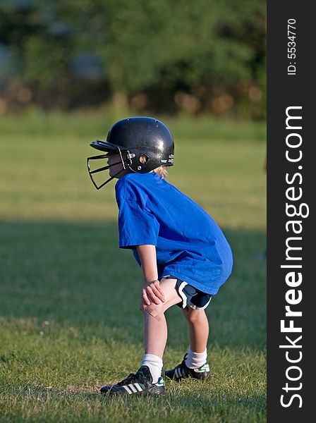 Young boy playing little league. Young boy playing little league