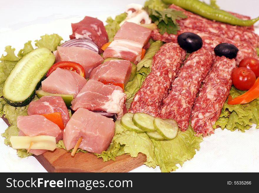 Nicely arranged raw grill pack of meat. Nicely arranged raw grill pack of meat