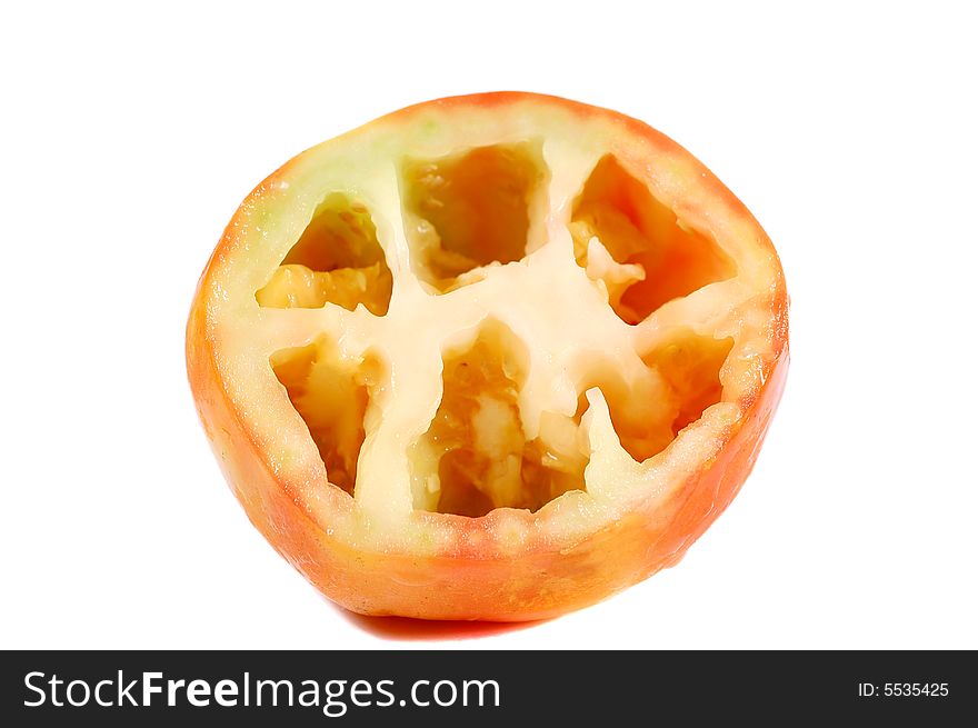 Tomato cut in half isolated on a white background. Tomato cut in half isolated on a white background