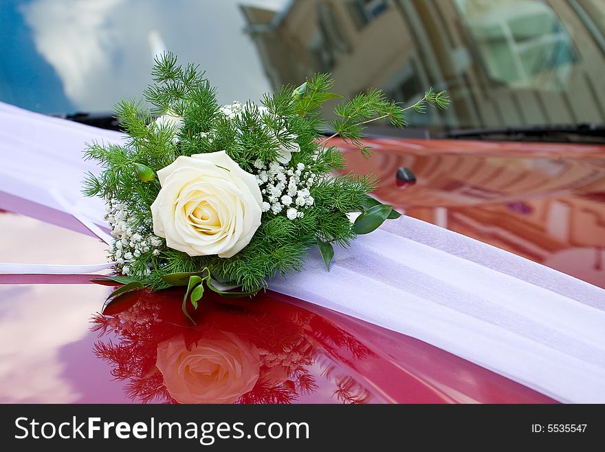 Flowers and car decorations at wedding