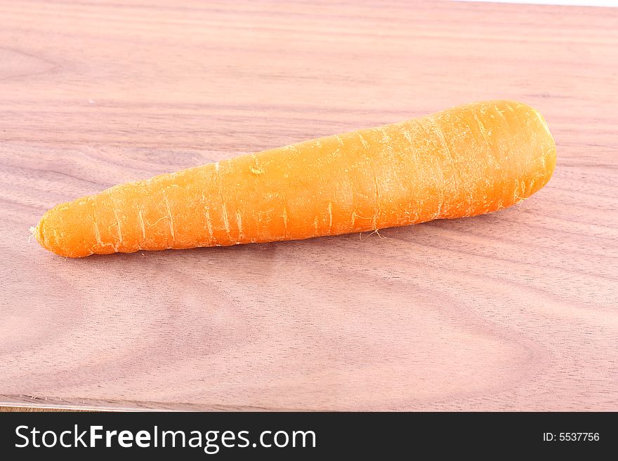 One large carrot, isolated on a background