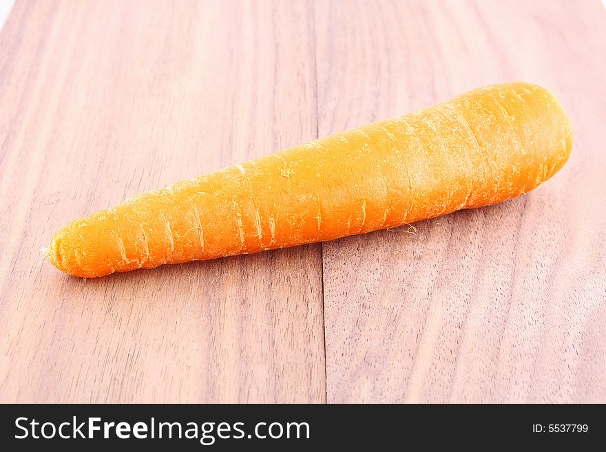 One large carrot, isolated on a background