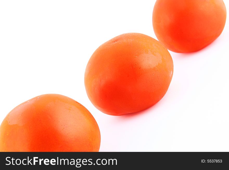 Fresh red tomato isolated on white