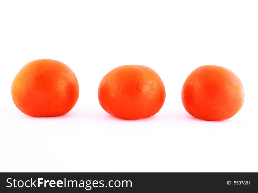 Fresh red tomato isolated on white