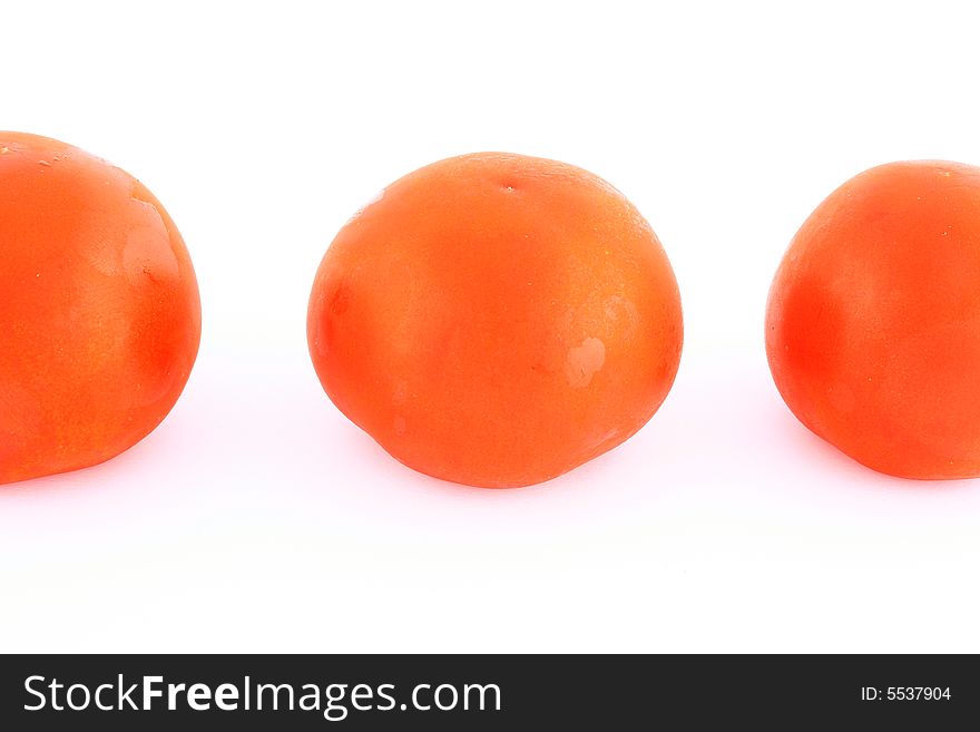 Fresh red tomato isolated on white