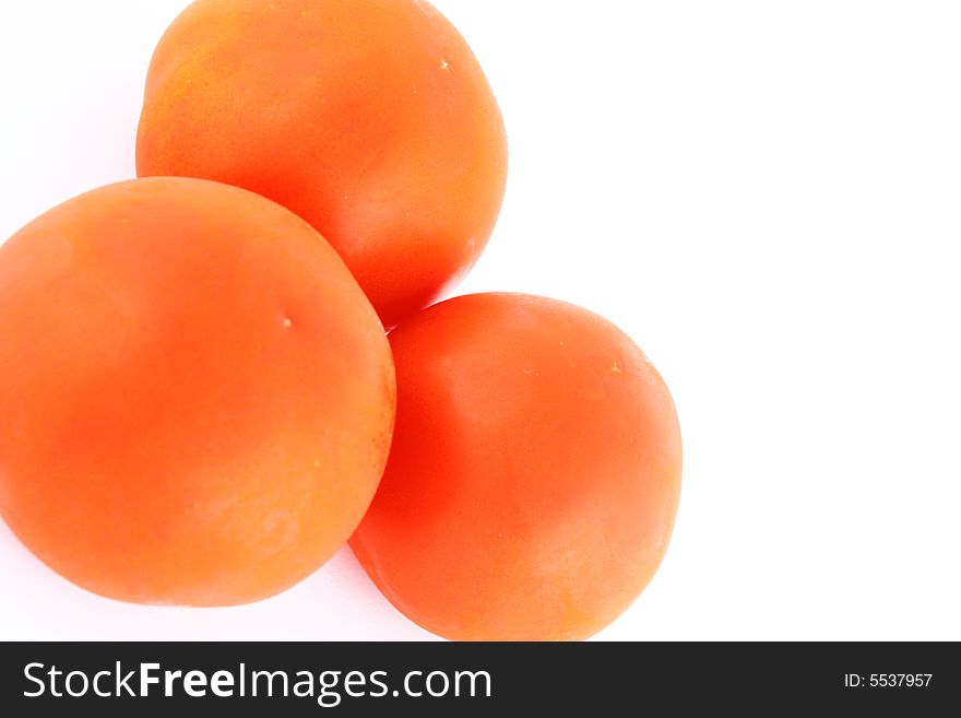 Fresh red tomato isolated on white