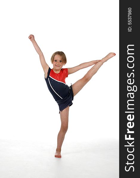 Young Girl Balancing On One Leg