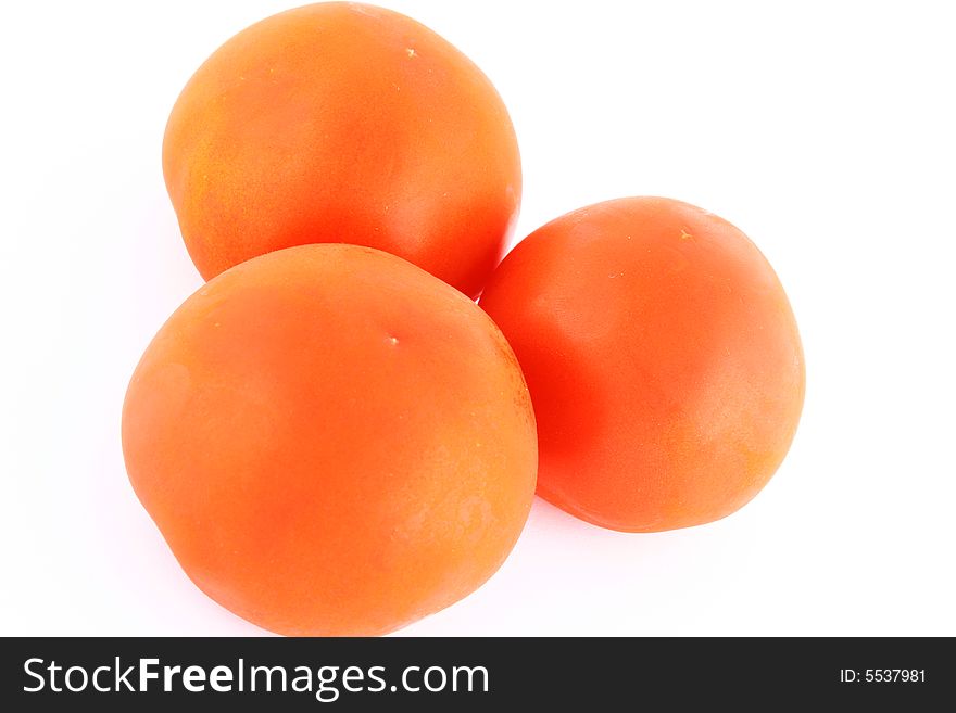 Fresh red tomato isolated on white