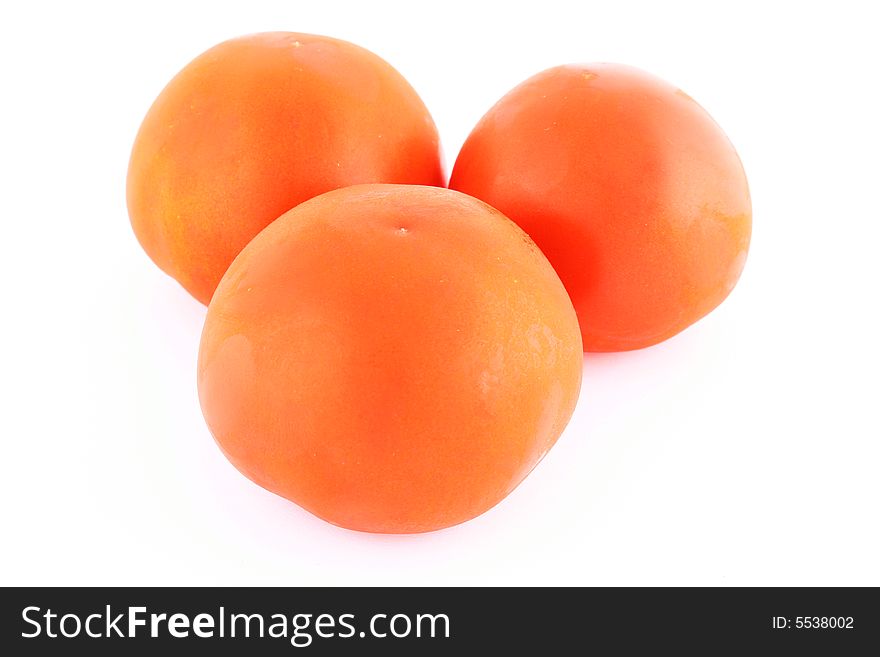 Fresh red tomato isolated on white