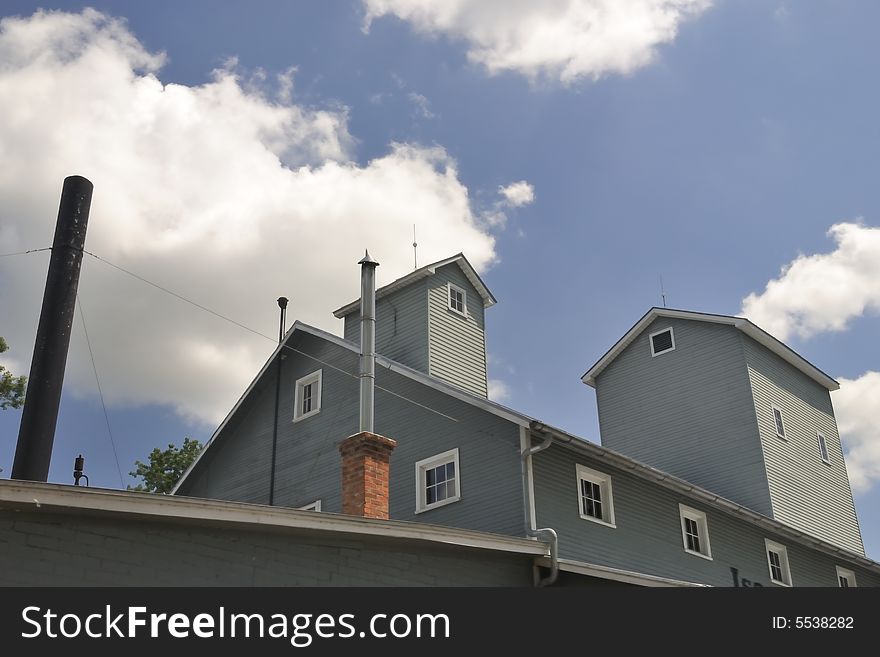 Architectural details of the roof on 19th century grain mill. All angle point up. Architectural details of the roof on 19th century grain mill. All angle point up.