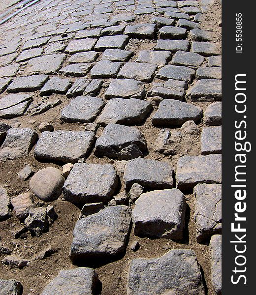 Cobbled stone road in the afternoon