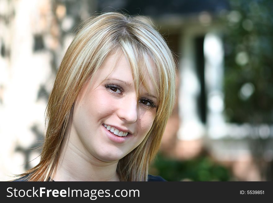 Beautiful woman standing and looking at camera