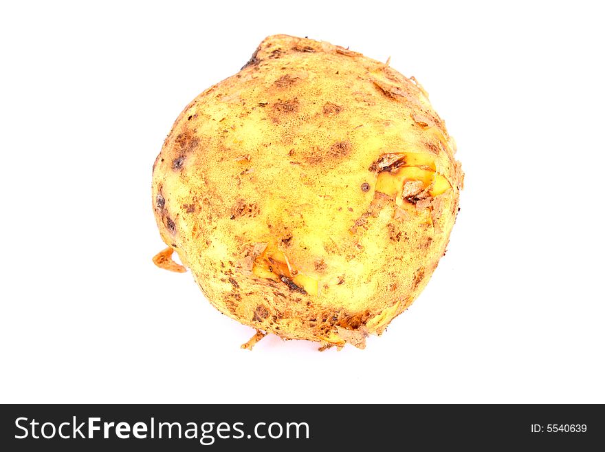 A single potato isolated on a white background