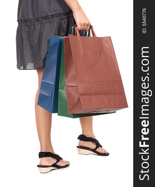 Shopping bags carried by a young female