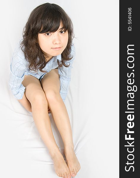 A young asian belle with knickers and light blue shirt