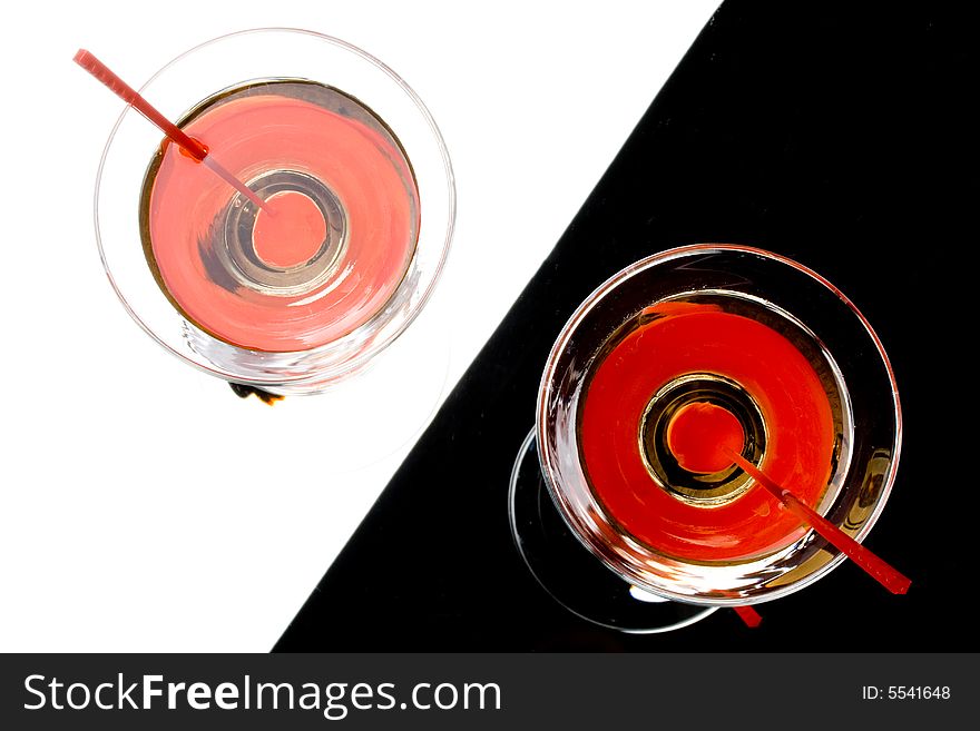 Martini with red cherry in a glass. Martini with red cherry in a glass