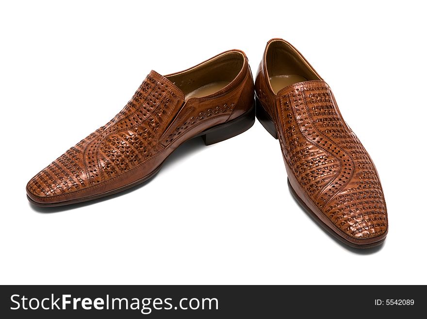 Brown low shoes on a white background