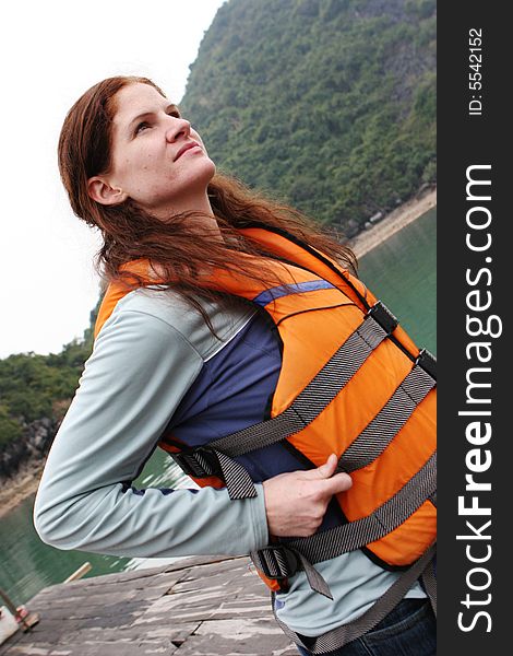 Portrait of a woman in a life jacket - health and fitness. Portrait of a woman in a life jacket - health and fitness.