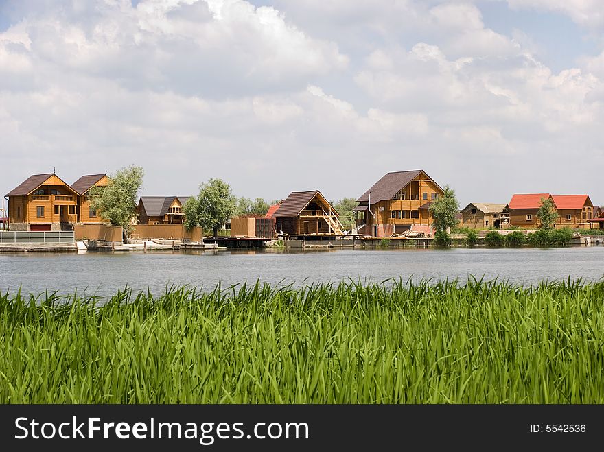 Cottage village on the river. Cottage village on the river