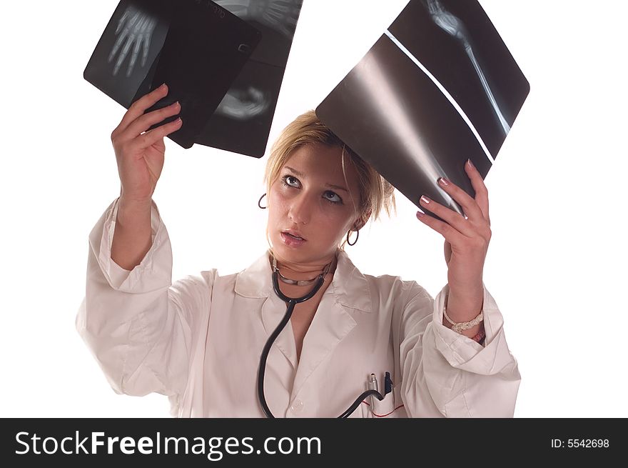 Doctor in medicine uniform holding x ray