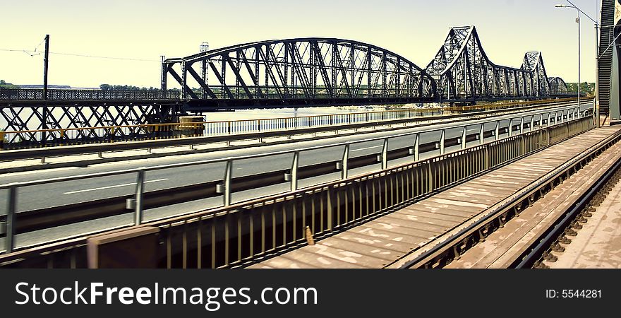 Crossing the Saligny bridge on rails