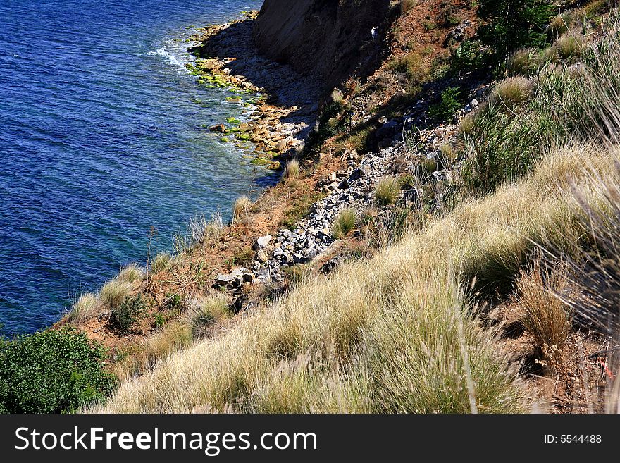 Seascape of blue mediterranean sea, a steep slope and coast. Italy. Seascape of blue mediterranean sea, a steep slope and coast. Italy