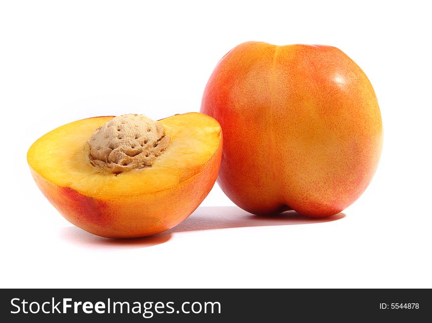 Half of peach on a white background