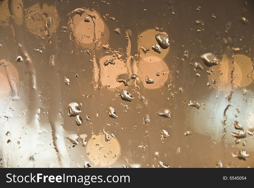 Close up shot of rain droplets on window