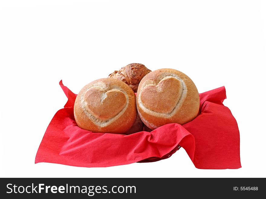 Buns with heart on basket. Buns with heart on basket