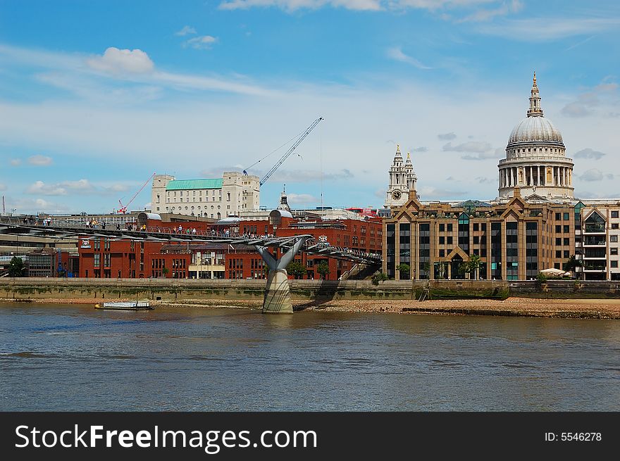 A view of St Paul Cathedral including the Millennium Bridge. A view of St Paul Cathedral including the Millennium Bridge
