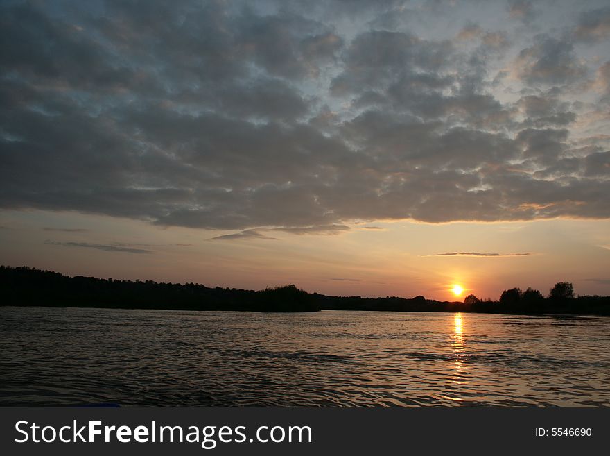 Sunset On The River