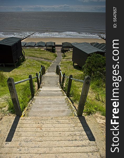 Steps down to the Sand,Sea and Beach Huts at Frinton. Steps down to the Sand,Sea and Beach Huts at Frinton