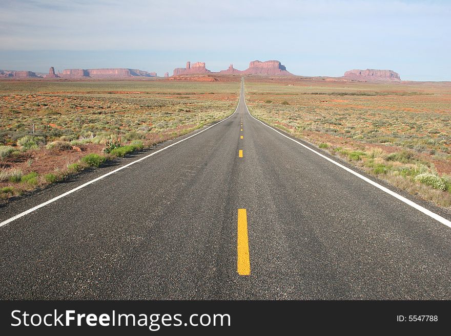 View of Monument Valley in Utah, looking south on highway. Arizona/Utah State line. USA