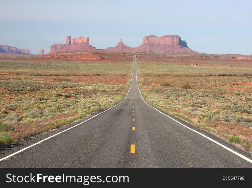 View of Monument Valley in Utah, looking south on highway. Arizona/Utah State line. USA