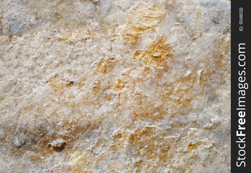 Stone with yellow spots, texture