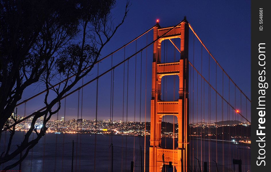 Image of golden gate bridge at night with skyline. Image of golden gate bridge at night with skyline