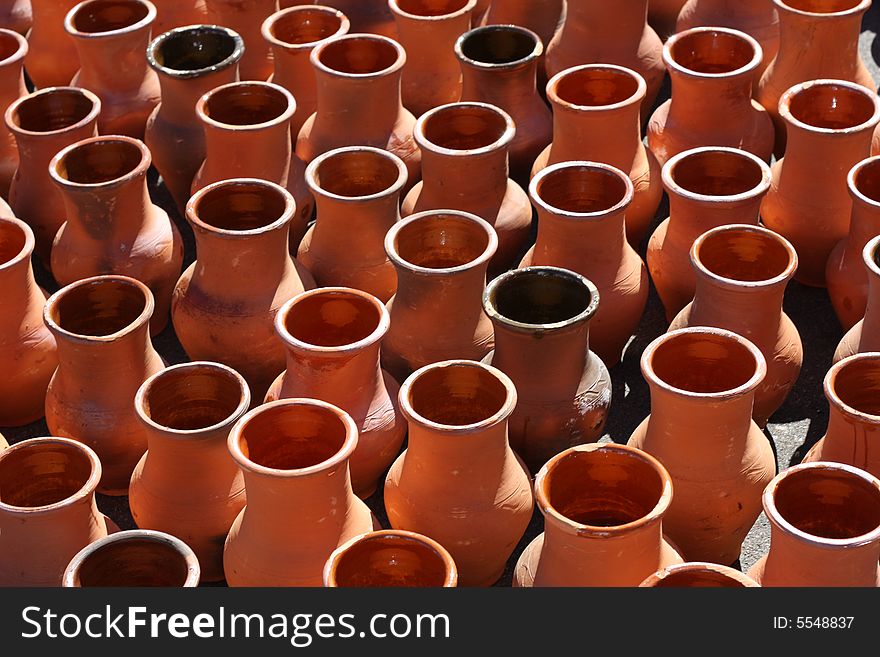 Brown clay pots on the ground