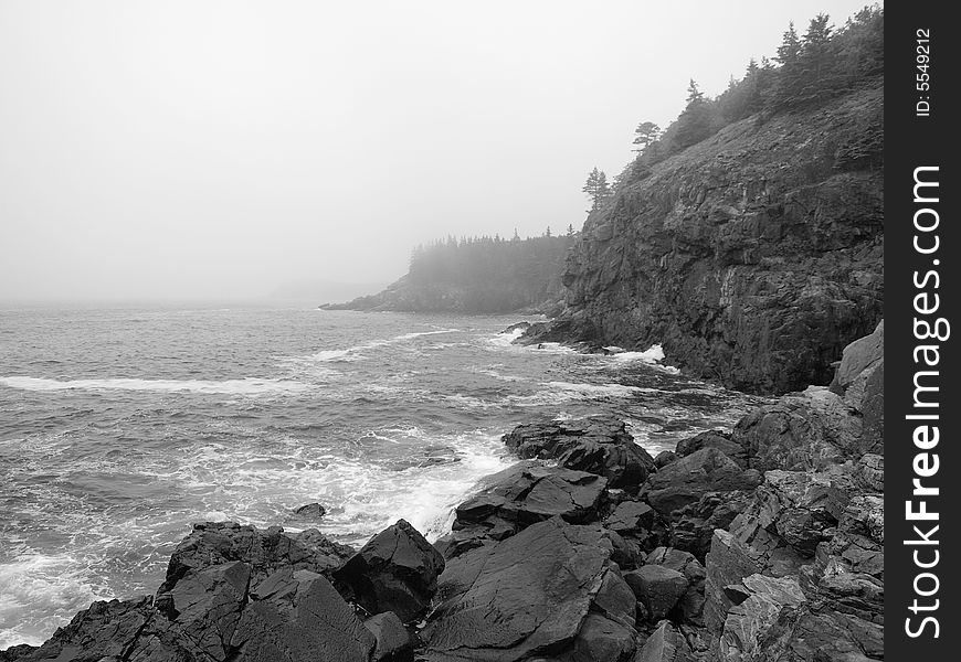 B&W of foggy ocean cliffs on the coast of Maine near Acadia National Park. B&W of foggy ocean cliffs on the coast of Maine near Acadia National Park.