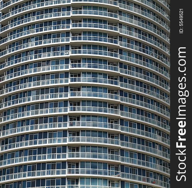 Windows and balconies of a modern condo tower. Windows and balconies of a modern condo tower.