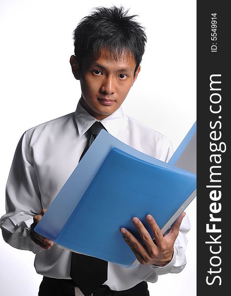 Asian business man holding file