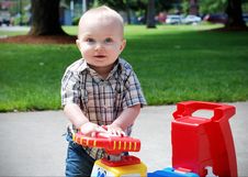 Baby Playing With Toy Truck - Horizontal Stock Images Baby Playing With Toy Truck - Horizontal Stock Images